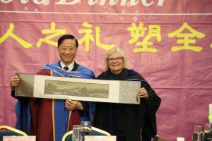 Guest Speaker Prof. Eleanor Gates-Stuart receiving a gift from President Ng - for being Guest Speaker - High Table Dinner, Division of Culture and Creativity (DCC) BNU-HKBU United International College